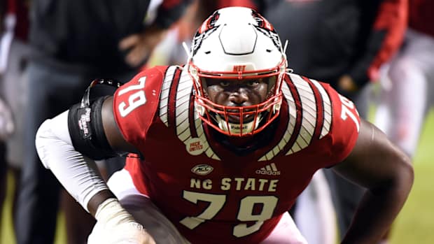 Oct 30, 2021; Raleigh, North Carolina, USA; North Carolina State Wolfpack tackle Ikem Ekwonu (79) warms up prior to a game against the Louisville Cardinals at Carter-Finley Stadium.